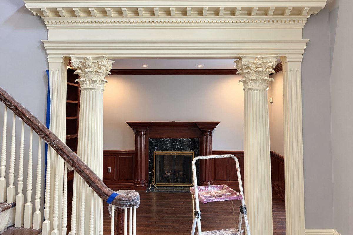 Grand cased opening painted cream with fluted Corinthian columns